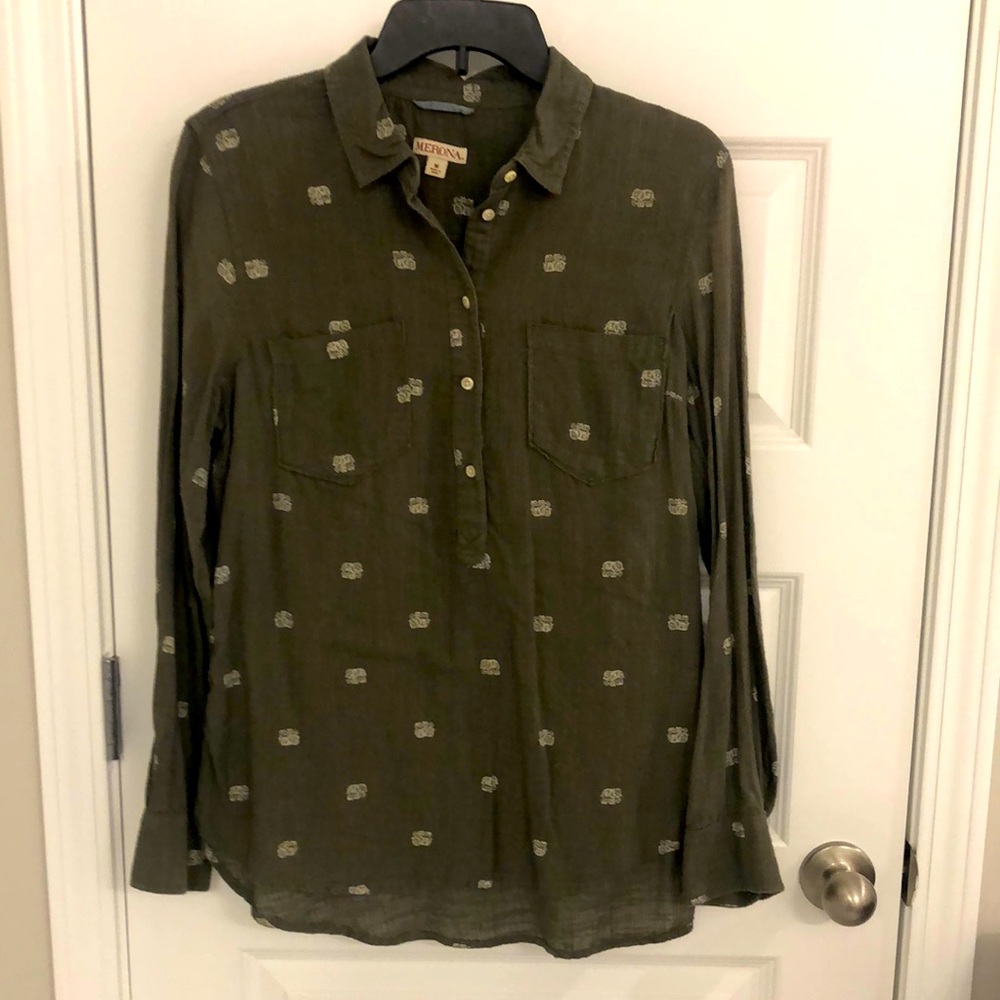 Olive green button down shirt with double breasted pockets.